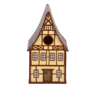 geel vakwerk vogel huis voorkant