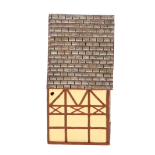 geel vakwerk vogel huis zijkant